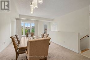 Toronto (L'amoreaux) townhouse for rent - A dining room with a table and chairs.