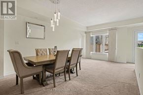 Toronto (L'amoreaux) townhouse for rent - A dining room with a table and chairs.
