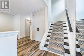 Shelburne apartment for rent - A staircase with a carpeted runner and white risers.