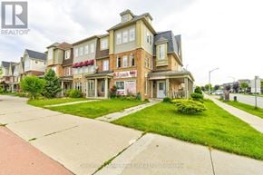Burlington (Alton) townhouse for rent - A row of houses with a sign that says "Argo" on it.