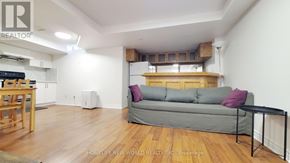 Mississauga (Hurontario) apartment for rent - A spacious hallway with a staircase and a box on the floor.