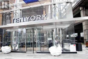 Toronto (Waterfront Communities) condo for rent - The entrance to a building with the word TENYORK displayed above it.