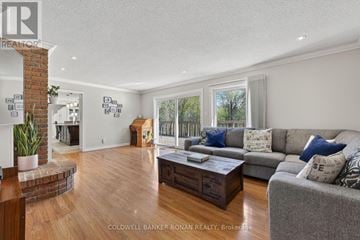 New Tecumseth apartment for rent - A living room with a grey couch and a coffee table.