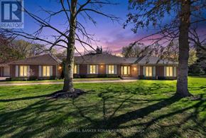 New Tecumseth apartment for rent - A house with a lawn and trees in front of it.