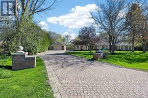 New Tecumseth apartment for rent - A brick pathway leads to a house with a green lawn on either side.