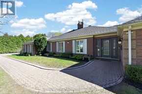 New Tecumseth apartment for rent - A house with a driveway in front of it.