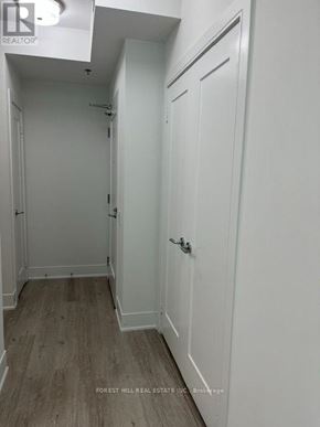 Toronto (Forest Hill South) house for rent - A white door with a handle and a small window above it.