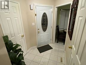 Markham (Middlefield) apartment for rent - A white door with a black mat in front of it.