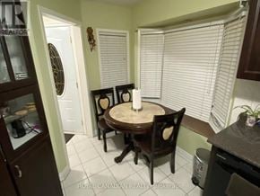 Markham (Middlefield) apartment for rent - A dining room with a table and chairs.
