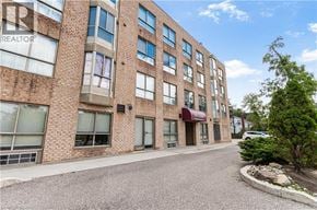 Richmond Hill apartment for rent - A building with the word REALTOR on it.