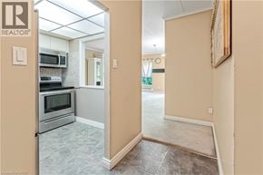 Richmond Hill apartment for rent - A kitchen with a microwave, oven, and refrigerator.