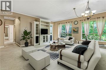 Richmond Hill apartment for rent - A living room with a white couch and a coffee table.