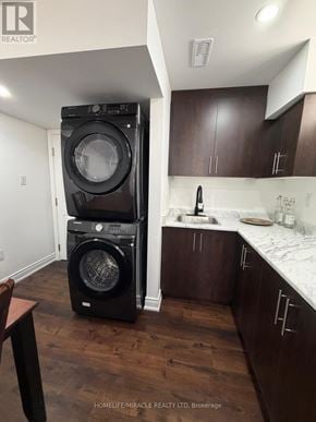 Halton Hills (Georgetown) apartment for rent - A black front loading washing machine in a kitchen.
