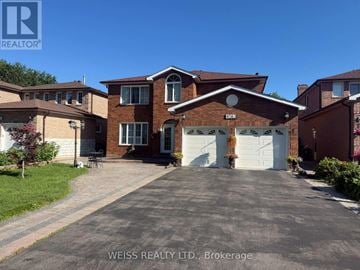 Toronto (Highland Creek) apartment for rent - A house with a driveway in front of it.