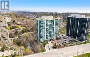 Mississauga (Clarkson) condo for rent - A real estate company logo is superimposed on a photo of a cityscape.