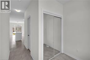 Brantford apartment for rent - A room with a sliding glass door and a tiled floor.