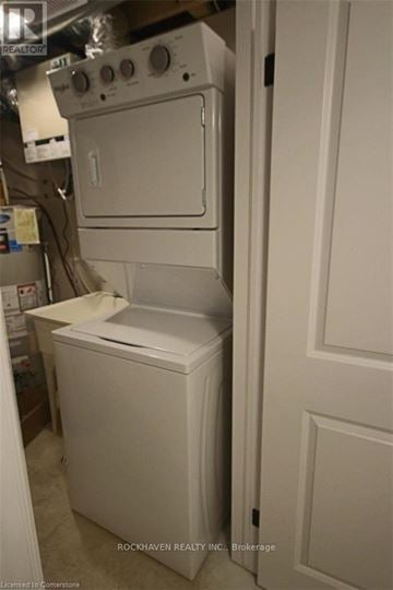 Hamilton (Gibson) townhouse for rent - A white oven and dishwasher in a kitchen.