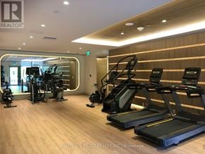 Toronto (York University Heights) condo for rent - A gym with treadmills and elliptical machines.