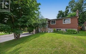 Bradford West Gwillimbury (Bradford) apartment for rent - A house with a lawn in front of it is for sale.