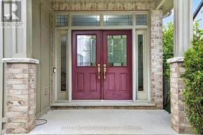 London South (South K) apartment for rent - A red double door with a glass window and a gold handle.