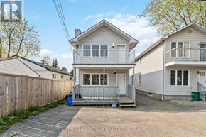 Ottawa apartment for rent - A two-story house with a garage is for sale.