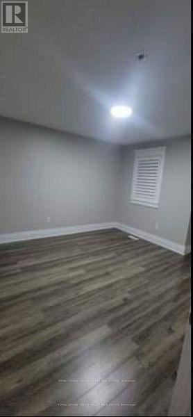 Brampton (Fletcher's Meadow) apartment for rent - A room with wooden flooring and a ceiling light.