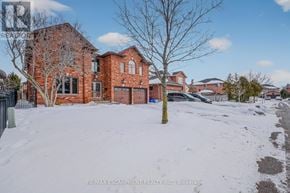 Hamilton (Stoney Creek) apartment for rent - A red brick house with a tree in front of it.