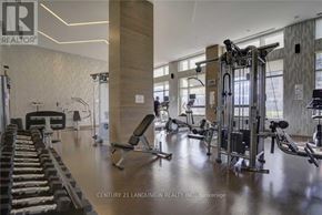 Markham (Unionville) condo for rent - A gym with a variety of equipment including a leg press machine.