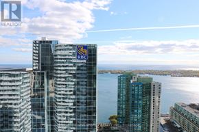 Toronto (Waterfront Communities) condo for rent - A tall building with the RBC logo on it.