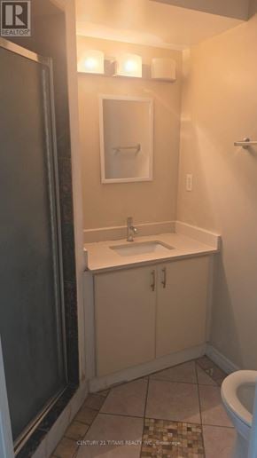 Ajax (Northwest Ajax) townhouse for rent - A bathroom with a sink, toilet and a mirror.