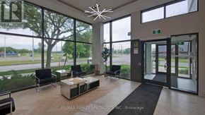 Brantford condo for rent - A waiting area with a view of the outside.
