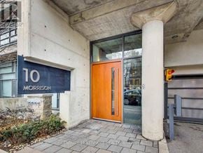 Toronto (Waterfront Communities) condo for rent - The front door of a building with a sign that reads "10 MORRISON".