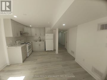 Mississauga (Lisgar) apartment for rent - A kitchen with white appliances and wooden floors.