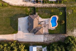 Winnipeg apartment for rent - A house with a pool in the backyard.