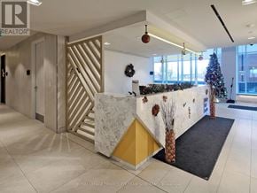 Toronto (Islington-City Centre West) condo for rent - A reception area with a Christmas tree and decorations.