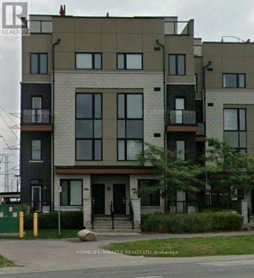 Pickering (Town Centre) townhouse for rent - A modern apartment building with balconies and a realtor logo on the top left.