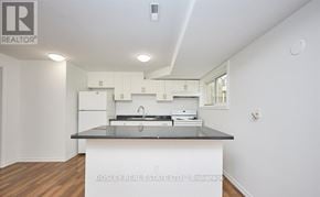 St. Catharines (Burleigh Hill) apartment for rent - A kitchen with a countertop and cabinets.