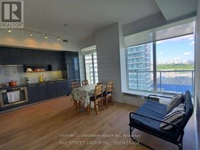 Toronto (Bayview Village) condo for rent - A realtor photo of a modern kitchen and dining area.
