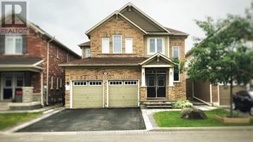 Brampton (Northwest Brampton) apartment for rent - A brick house with a garage is for sale.