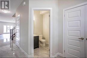 London South (South W) townhouse for rent - A white bathroom with a toilet and sink.