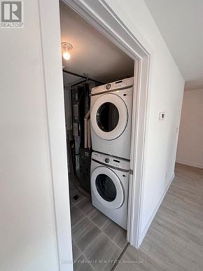 Guelph (Clairfields/Hanlon Business Park) townhouse for rent - A washing machine is in a small alcove.