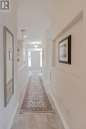 Lincoln (Lincoln-Jordan/Vineland) apartment for rent - A hallway with a rug and pictures on the wall.
