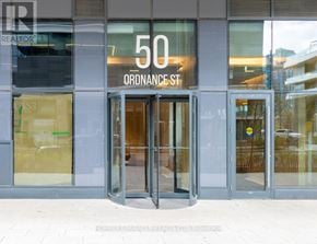 Toronto (Niagara) condo for rent - The front of a building with the number 50 and the word Ordnance St on it.