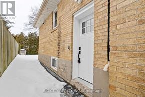 Toronto (Wexford-Maryvale) apartment for rent - A white door is on a brick house.