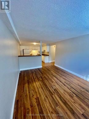 Markham (Old Markham Village) multi-family for rent - A room with wooden flooring and white walls.