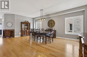 Southgate apartment for rent - A dining room with a wooden table and chairs.