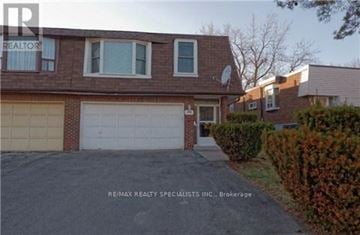 Toronto (Hillcrest Village) apartment for rent - A house with a garage is shown in the image.