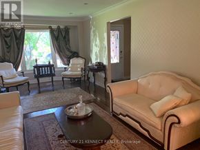 Vaughan (Crestwood-Springfarm-Yorkhill) apartment for rent - A living room with a couch, chair, and coffee table.