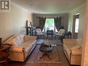Vaughan (Crestwood-Springfarm-Yorkhill) apartment for rent - A living room with a white sofa and a coffee table.