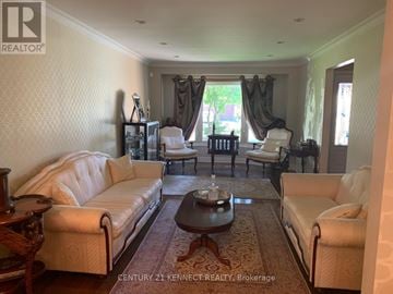 Vaughan (Crestwood-Springfarm-Yorkhill) apartment for rent - A living room with a white sofa and a coffee table.